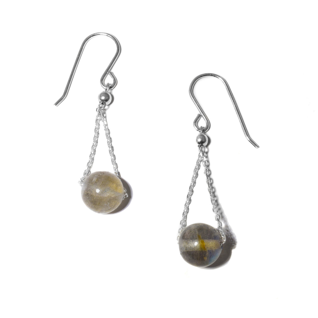These drop labradorite earrings are made from sterling silver and labradorite gemstones. The labradorite spheres have gold chains running through them giving them a chandelier appearance.