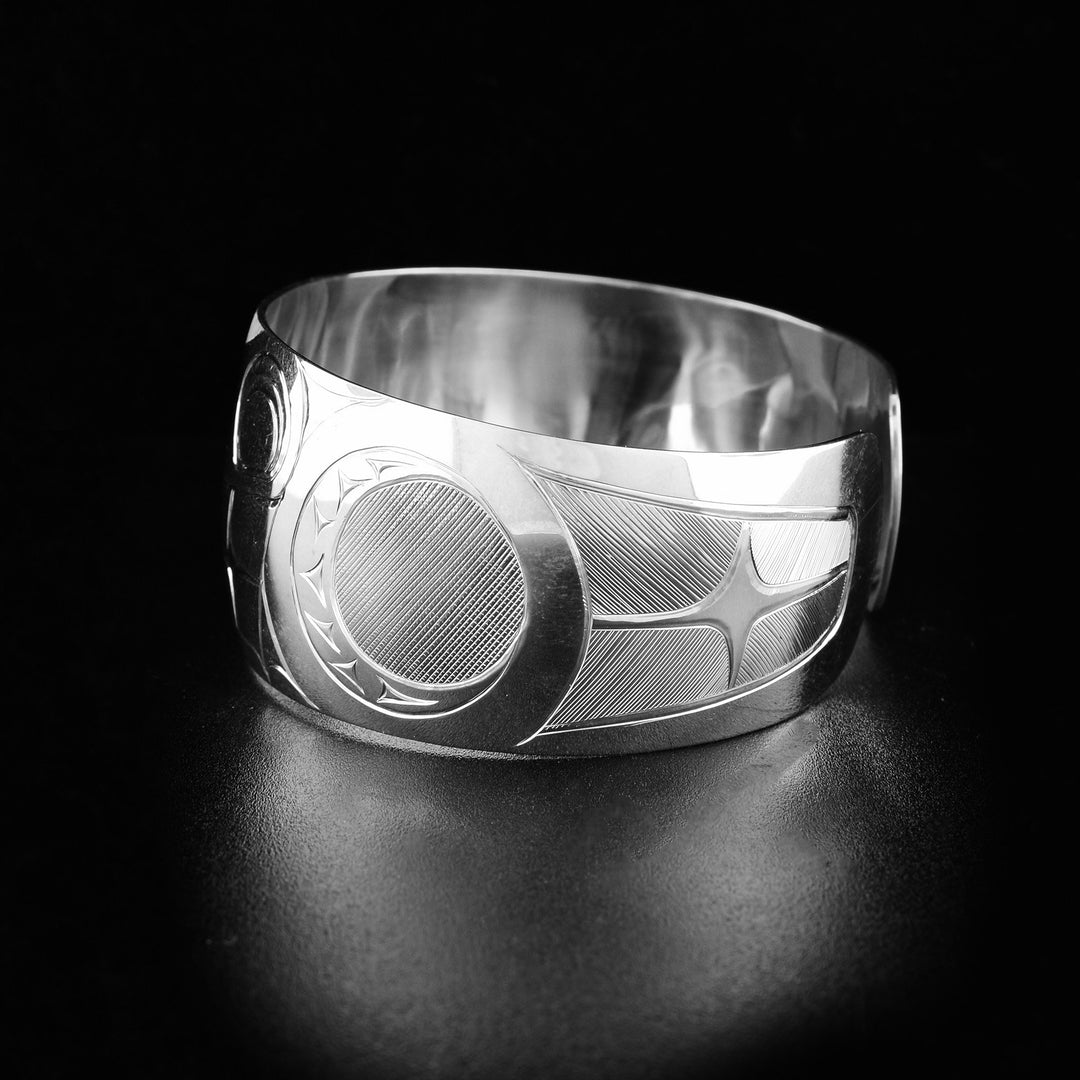 Sterling silver bear bracelet hand-carved by Haisla artist Hollie Bartlett.