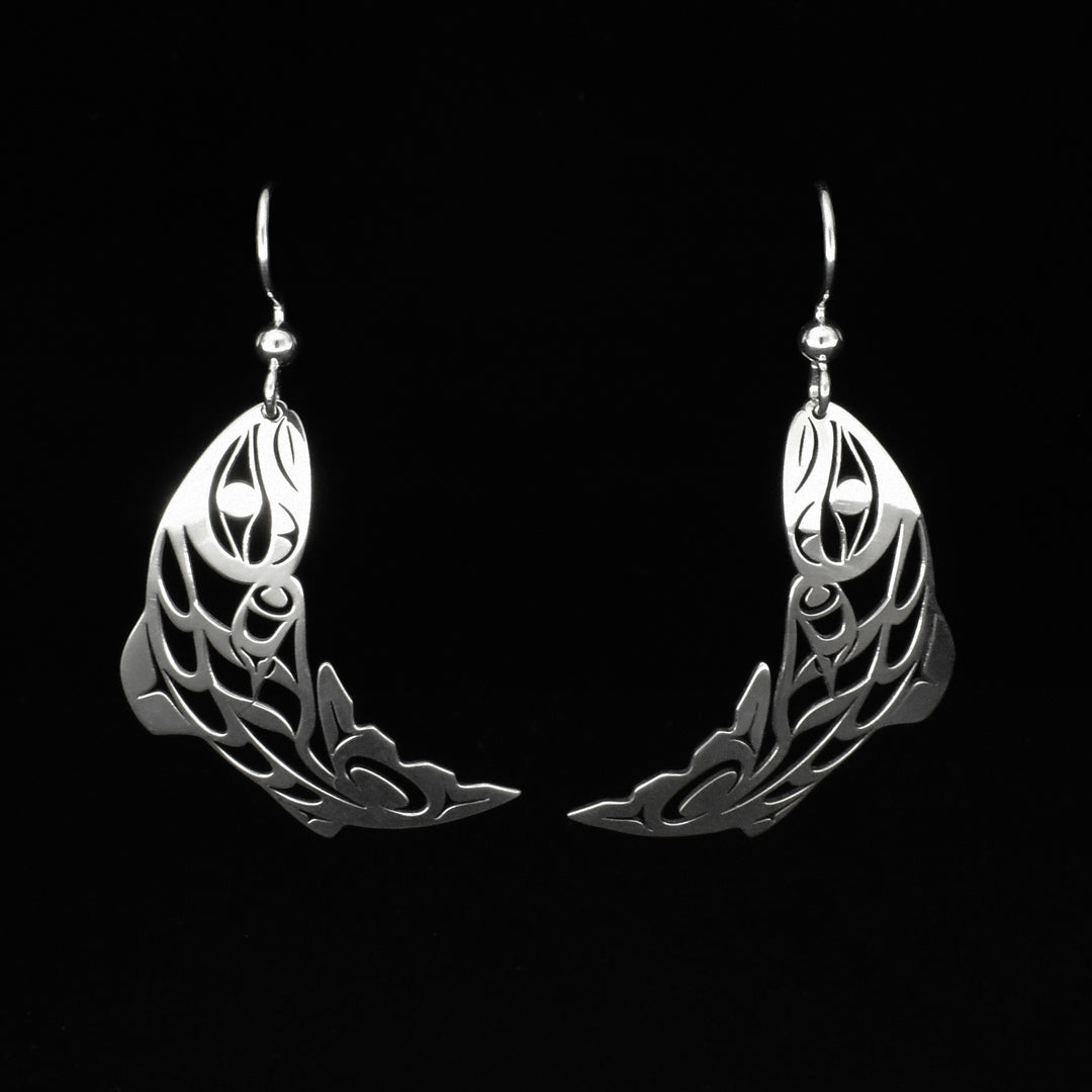 These sterling silver Salmon earrings have long hangs shaped like the Salmon. There are cutouts and designs that have been cast into the hangs depicting the Salmon.
