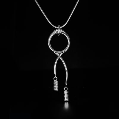 Sterling Silver Play Pendant handcrafted by artist Lynda Constantine. Pendant measures 2.75" x 0.80" including bail. Chain not included.