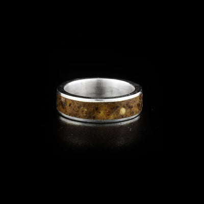 Thick sterling silver band with amber strip across.