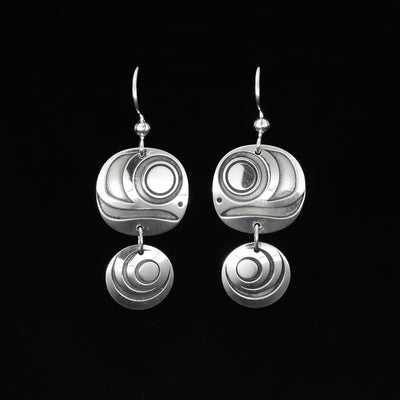 Stunning salmon egg two-piece dangle earrings by Tahltan artist Grant Pauls. Made of sterling silver. Each earring measures 1.63" x 0.63" including hook.
