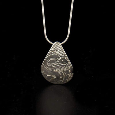 Sterling silver teardrop eagle pendant hand-carved by Kwakwaka'wakw artist Victoria Harper. Pendant measures 1.25" x 1". Chain not included.