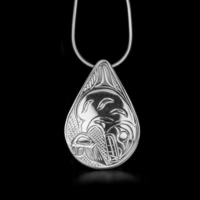 Detailed teardrop orca pendant hand-carved by Kwakwaka'wakw artist Victoria Harper. Made of sterling silver. Pendant measures 1.40" x 1". Hidden bail on back. Chain not included. The orca legend represents: longevity, protection, family.