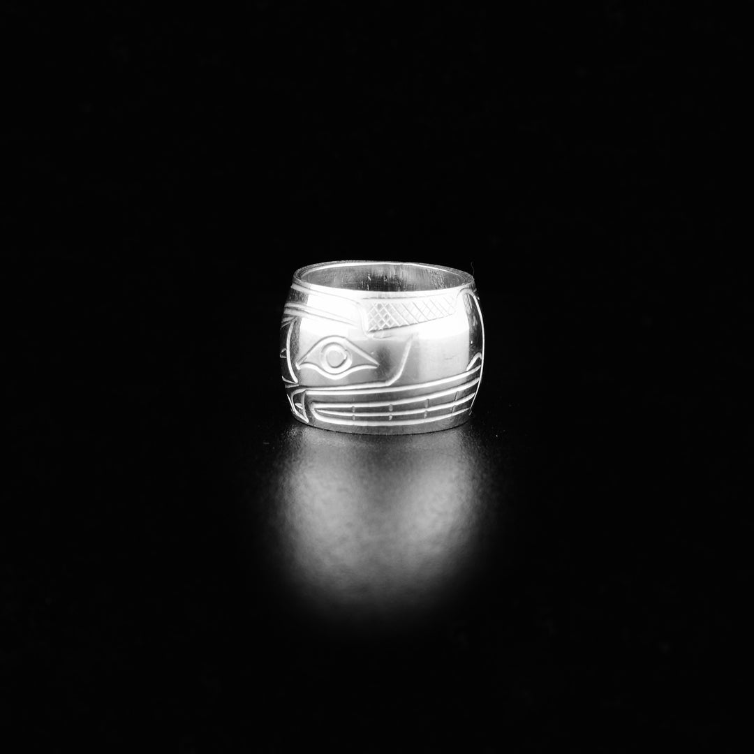 These Wolf spirit beads are made from sterling silver and there is a depiction of the Wolf carved into the surface of it.